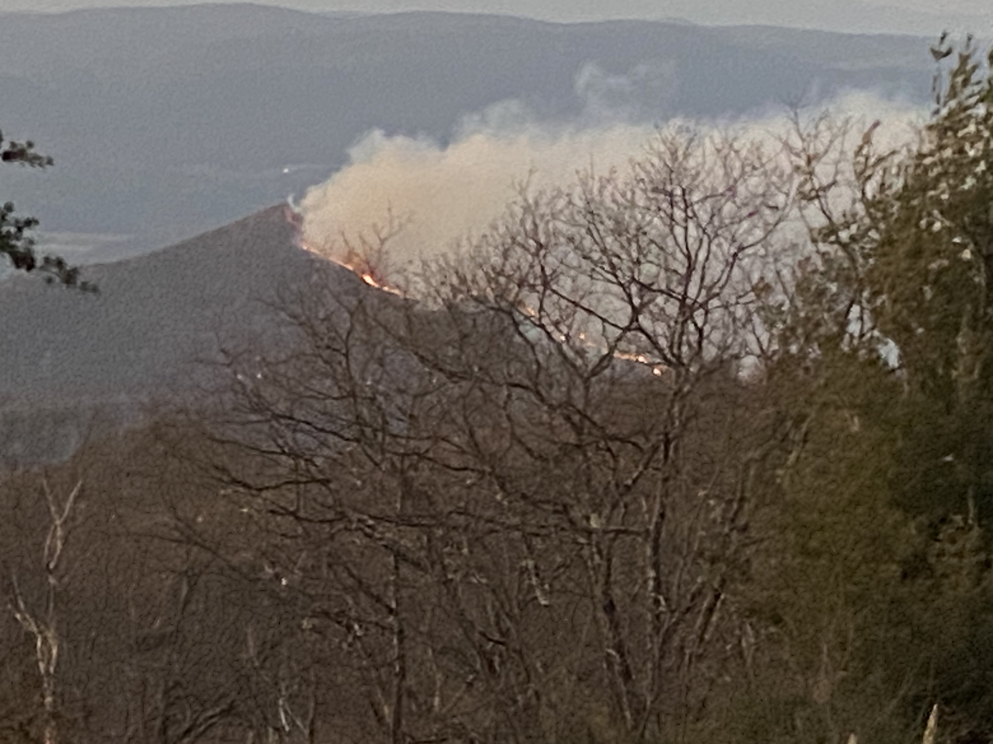 

						Heavener Ridge Fire Early Morning Smoke -GWJNF J. Herring
			