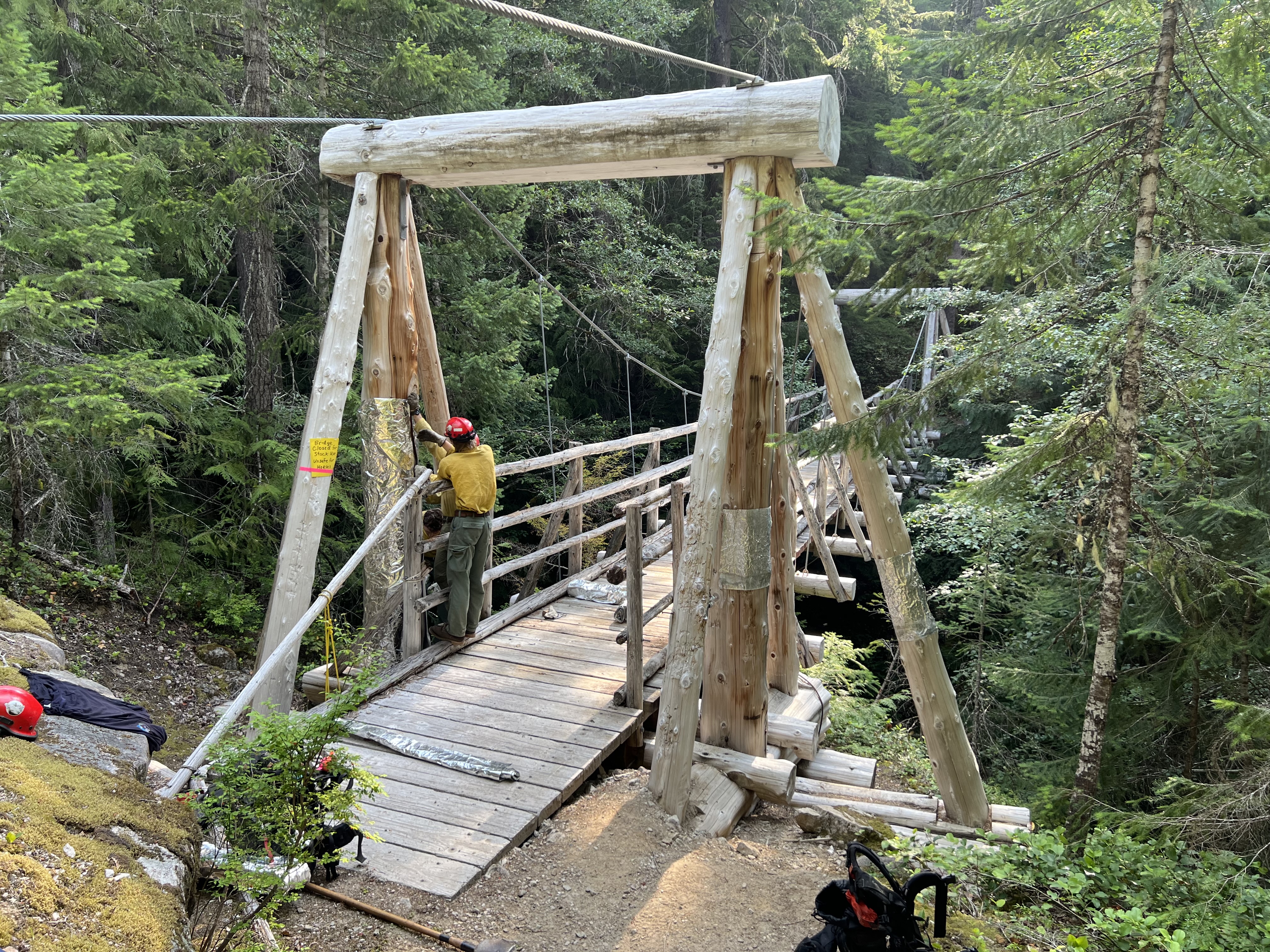 

						Miners Complex - Canyon Creek suspension bridge wrap
			