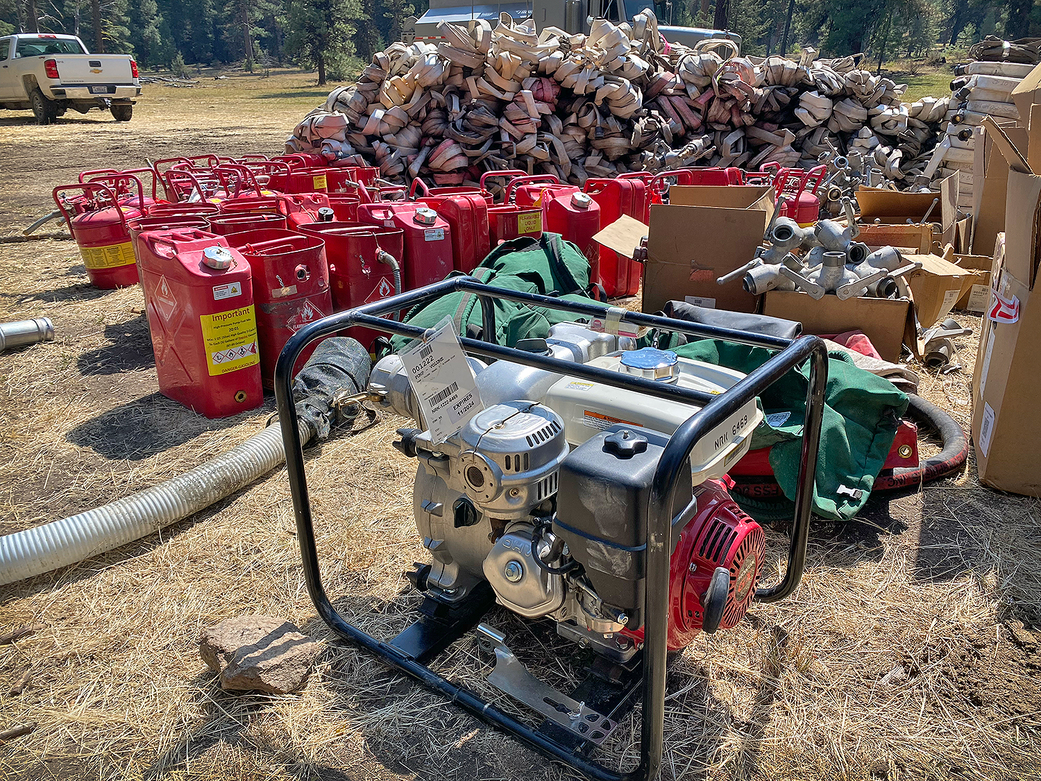 

						Pumps and Hose Staged for Backhaul Falls &amp; Telephone Fires
			