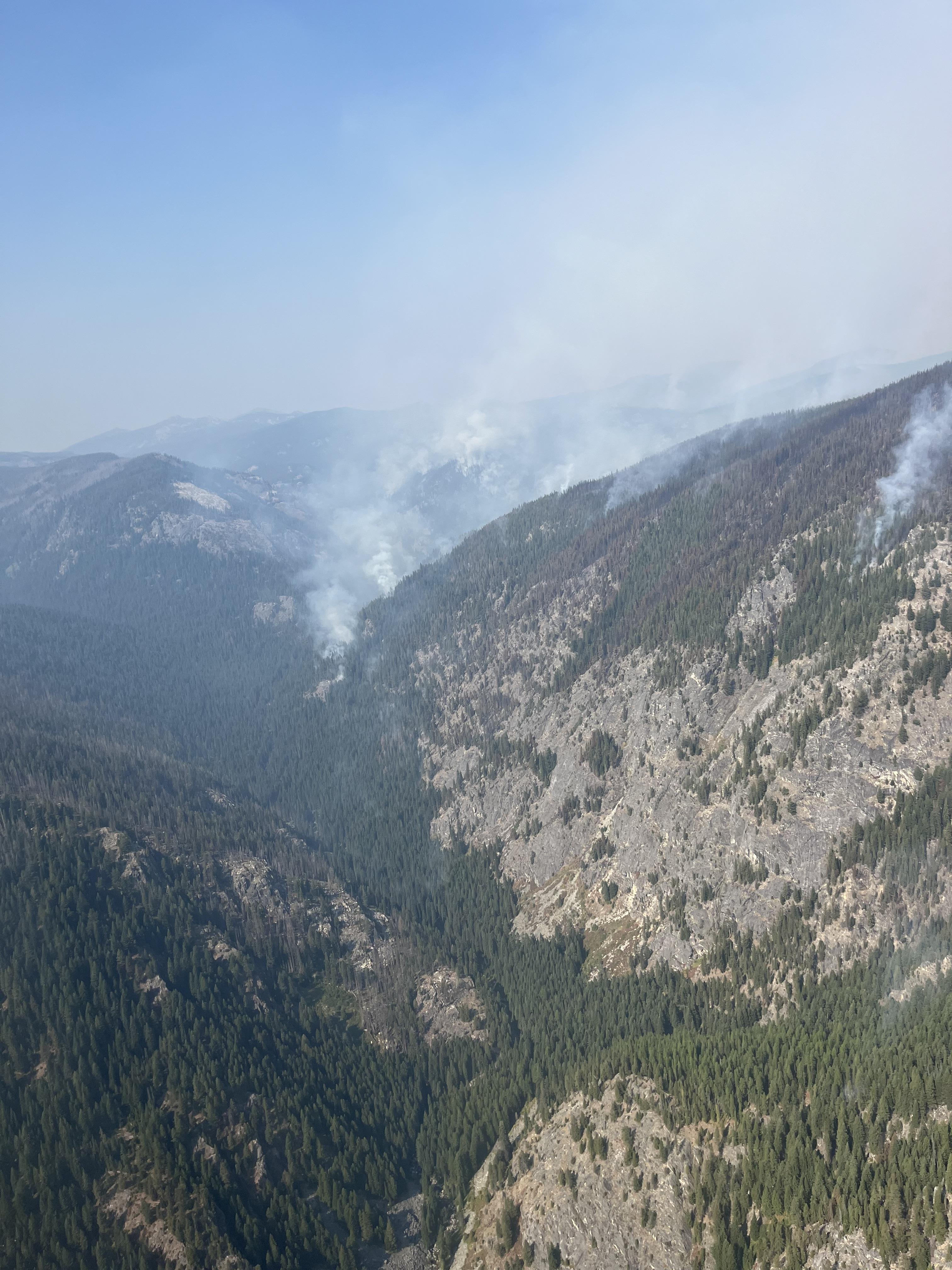 

						Aerial Photo of Steep Terrain on Fire
			