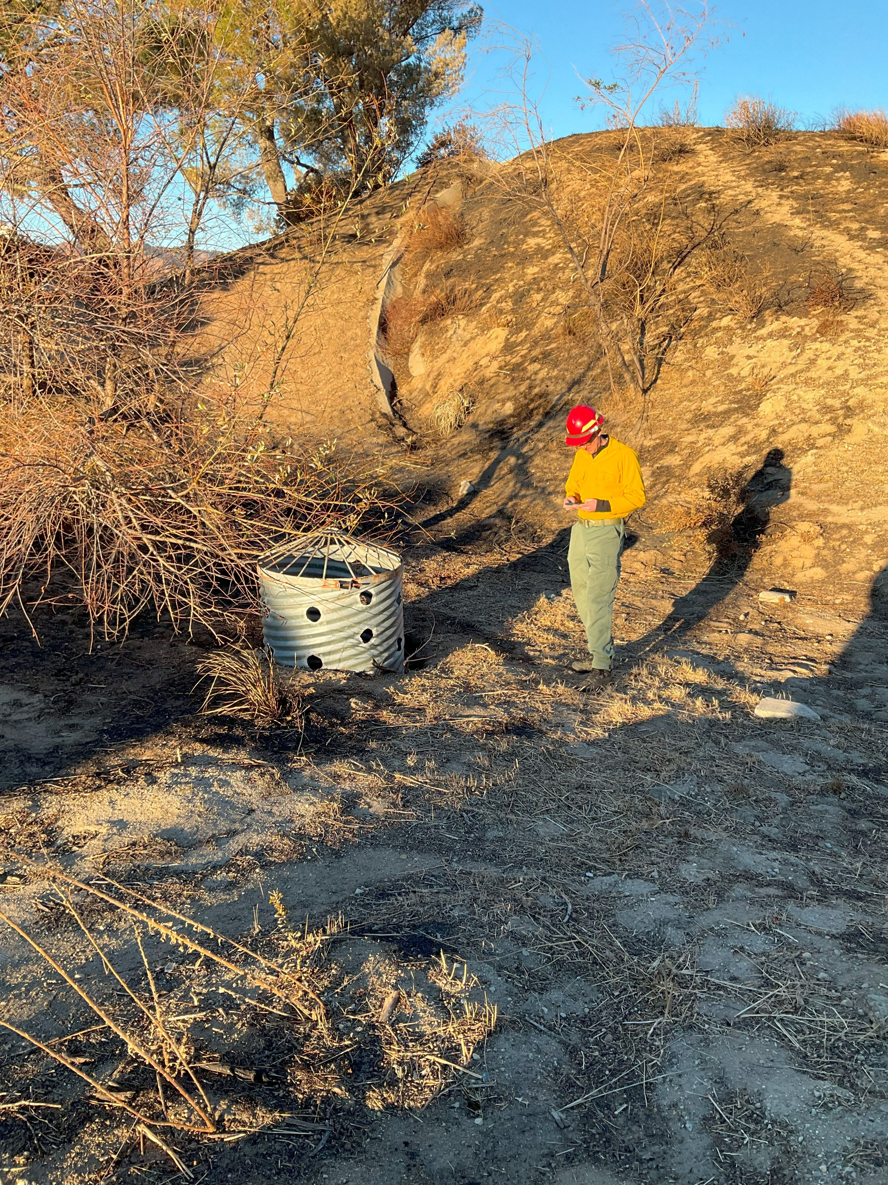 

						BAER Hydrologist Kyle Wright Assesses Culvert Riser within Eaton Burned Area
			