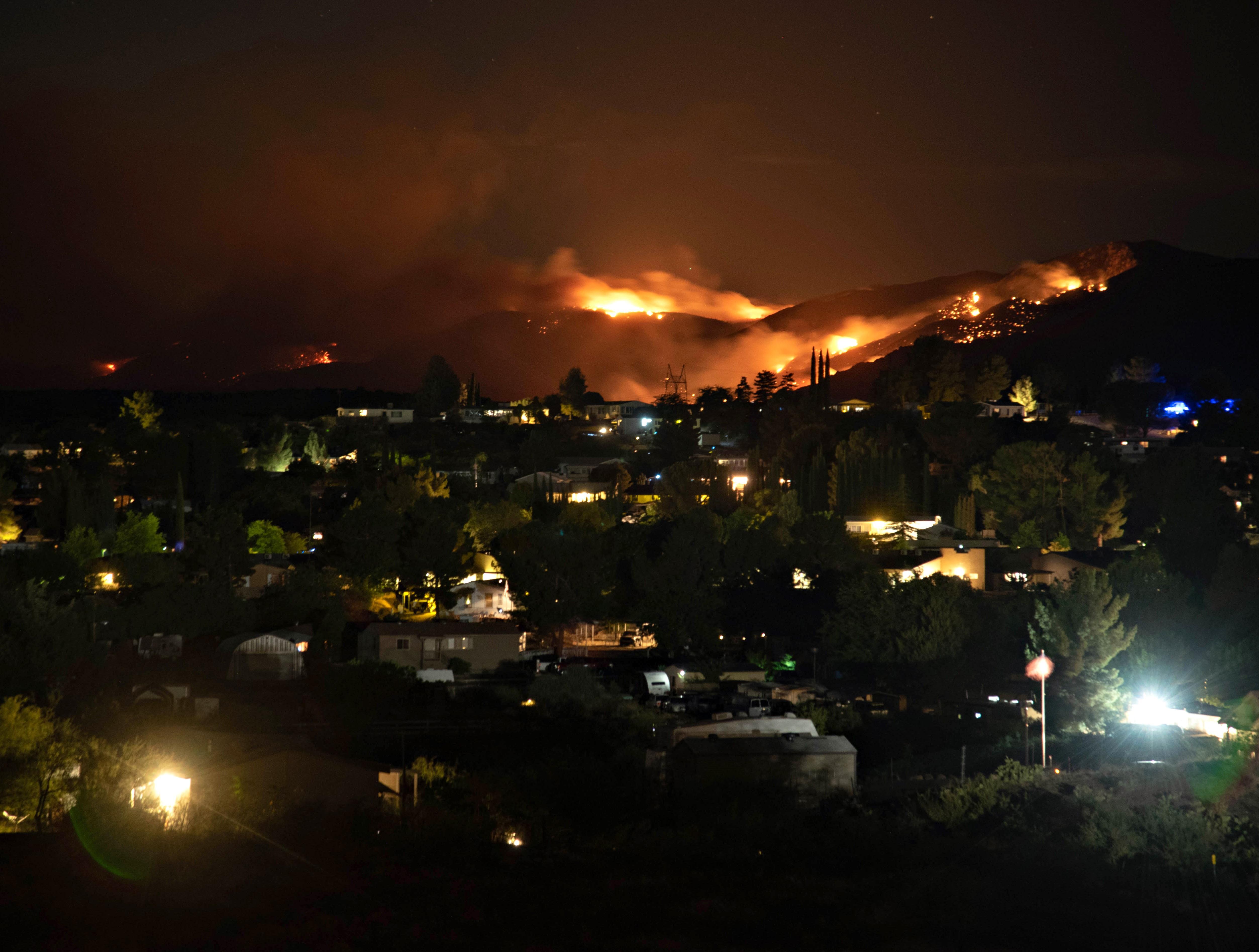 Nightime photo taken July 6 of Tiger fire from ICP bright flames in night