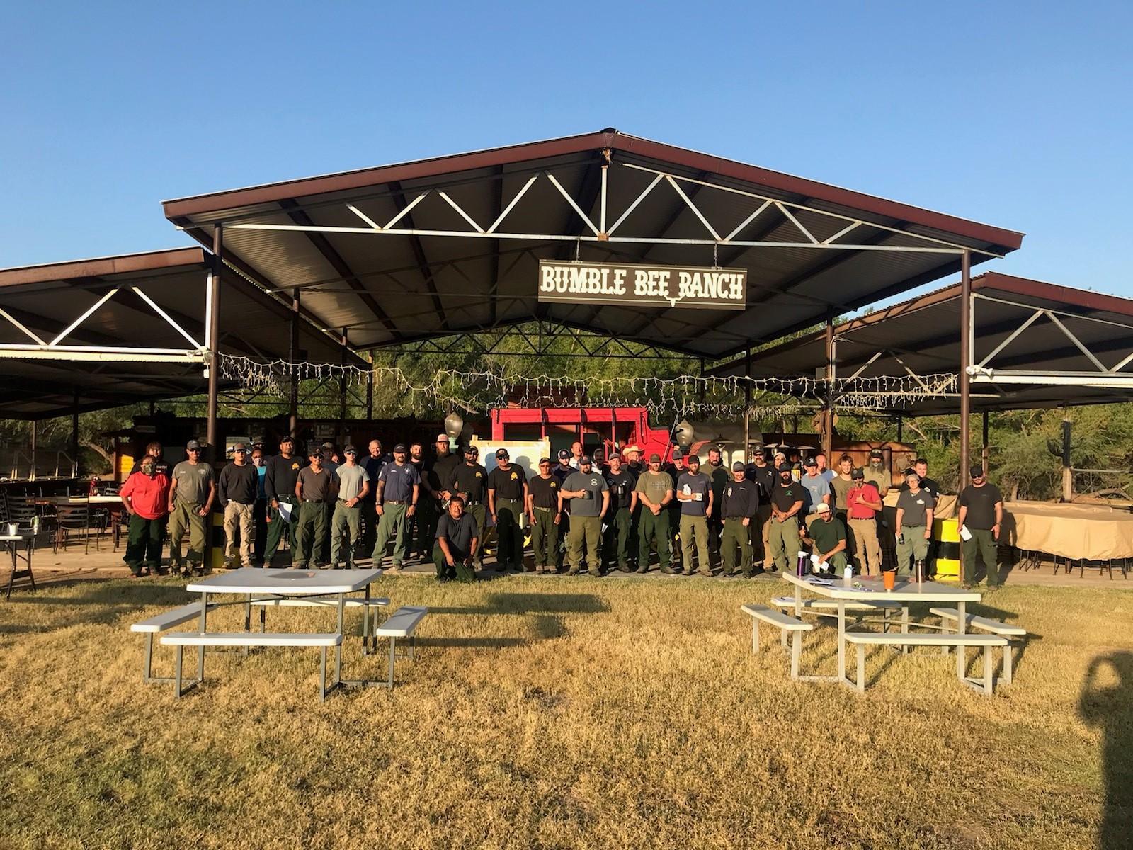 Group photo of firefighters spike out at Bumble Bee Ranch July 9