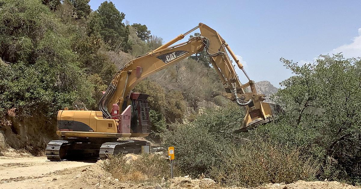 Work being done on Crown King road using heavy equipment to remove brush. July 10, 2021