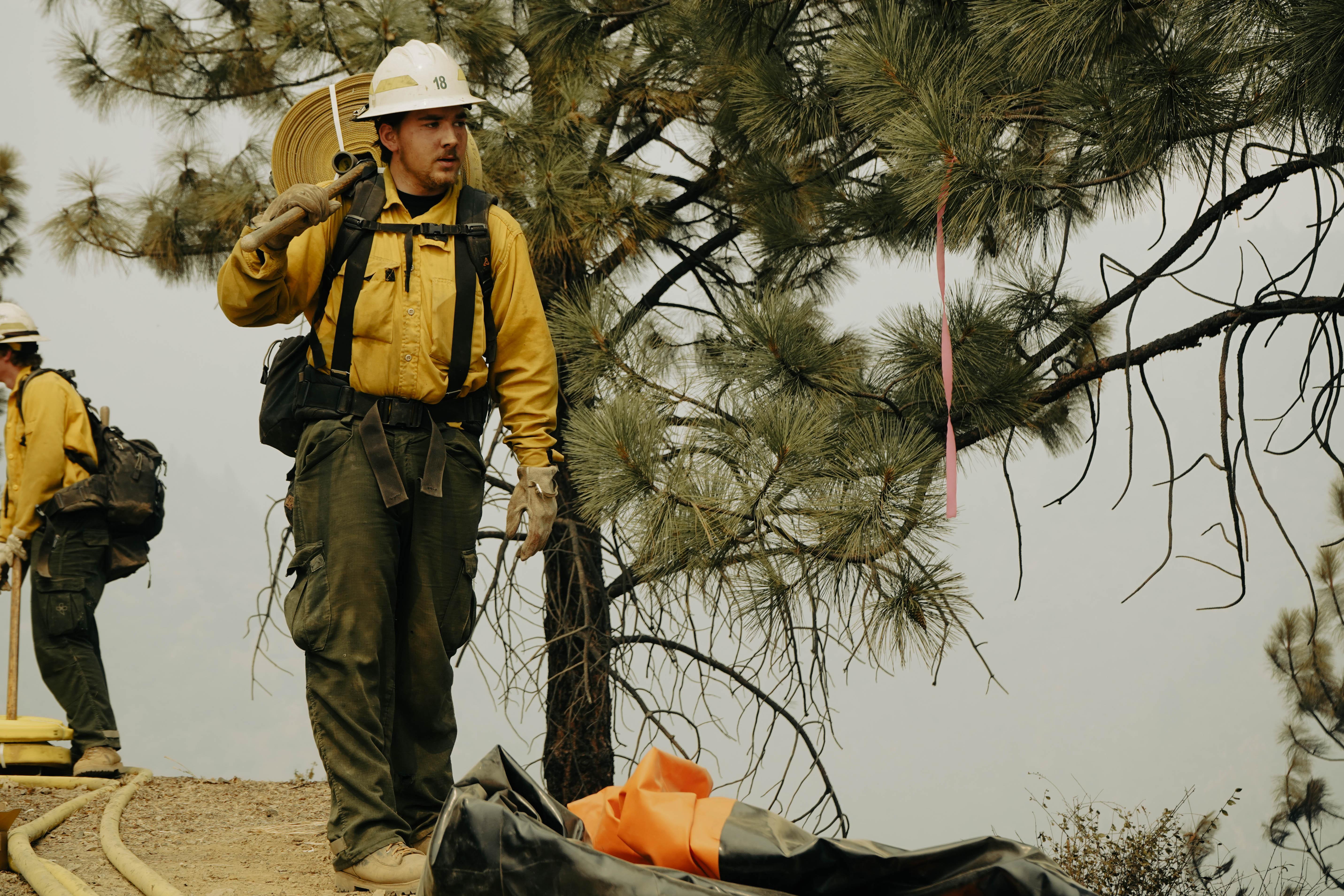 Crews with E-282, Worland FPD (Worland, Wyoming) and GFP Enterprises work to build containment lines, Aug. 22, on the Cronan Fire, one of three fires comprising the River Complex. (U.S. Forest Service photo courtesy of Benjamin Cossel)