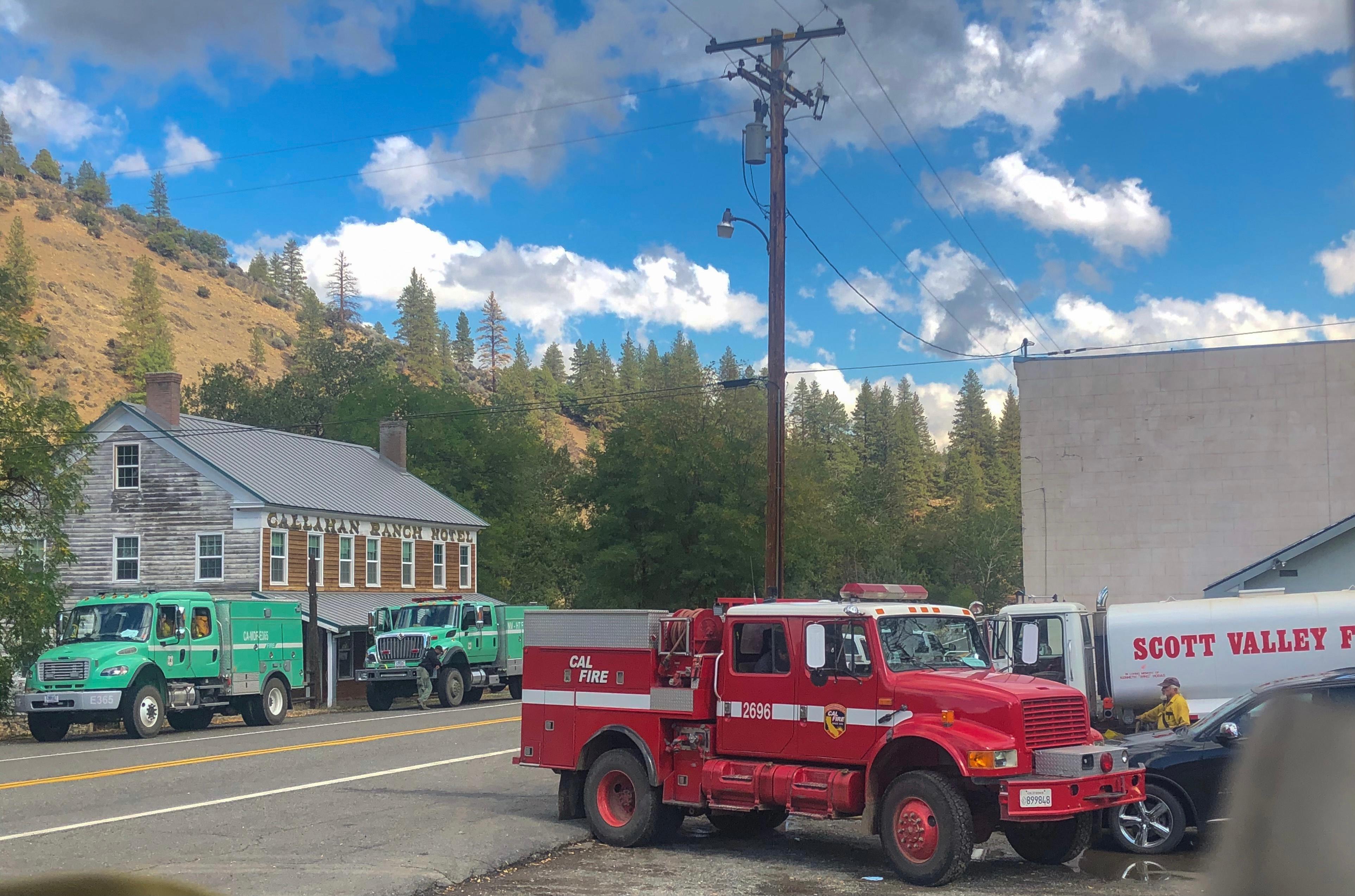 Two Forest Service fire engines, a Cal Fire fire engine, and a Scott Valley fire vehicle.
