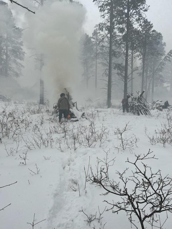 Firefighters pile burning in Summit Lake area