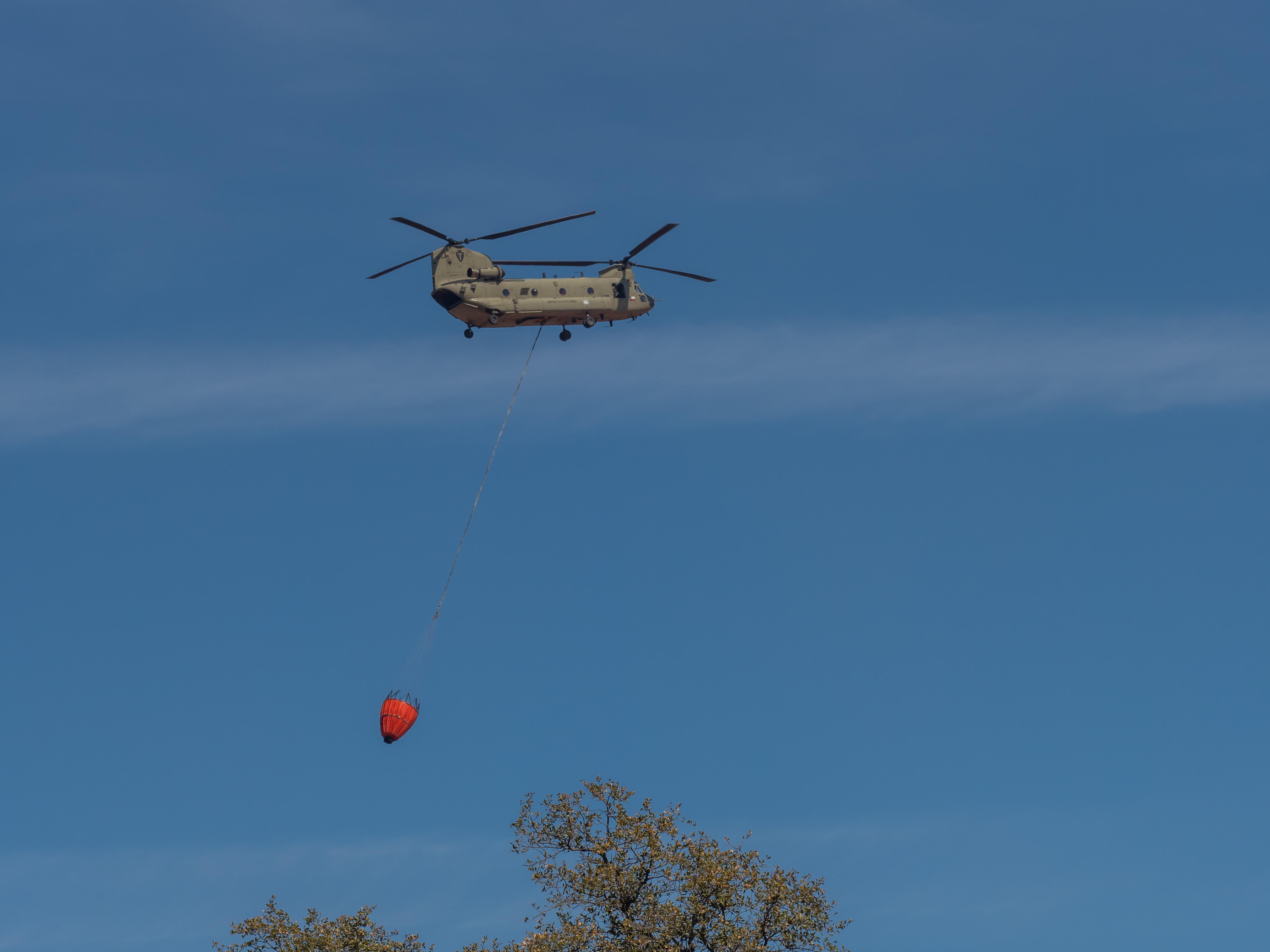 Texas National Guard Chinook flying over the Eastland Complex on March 18, 2022