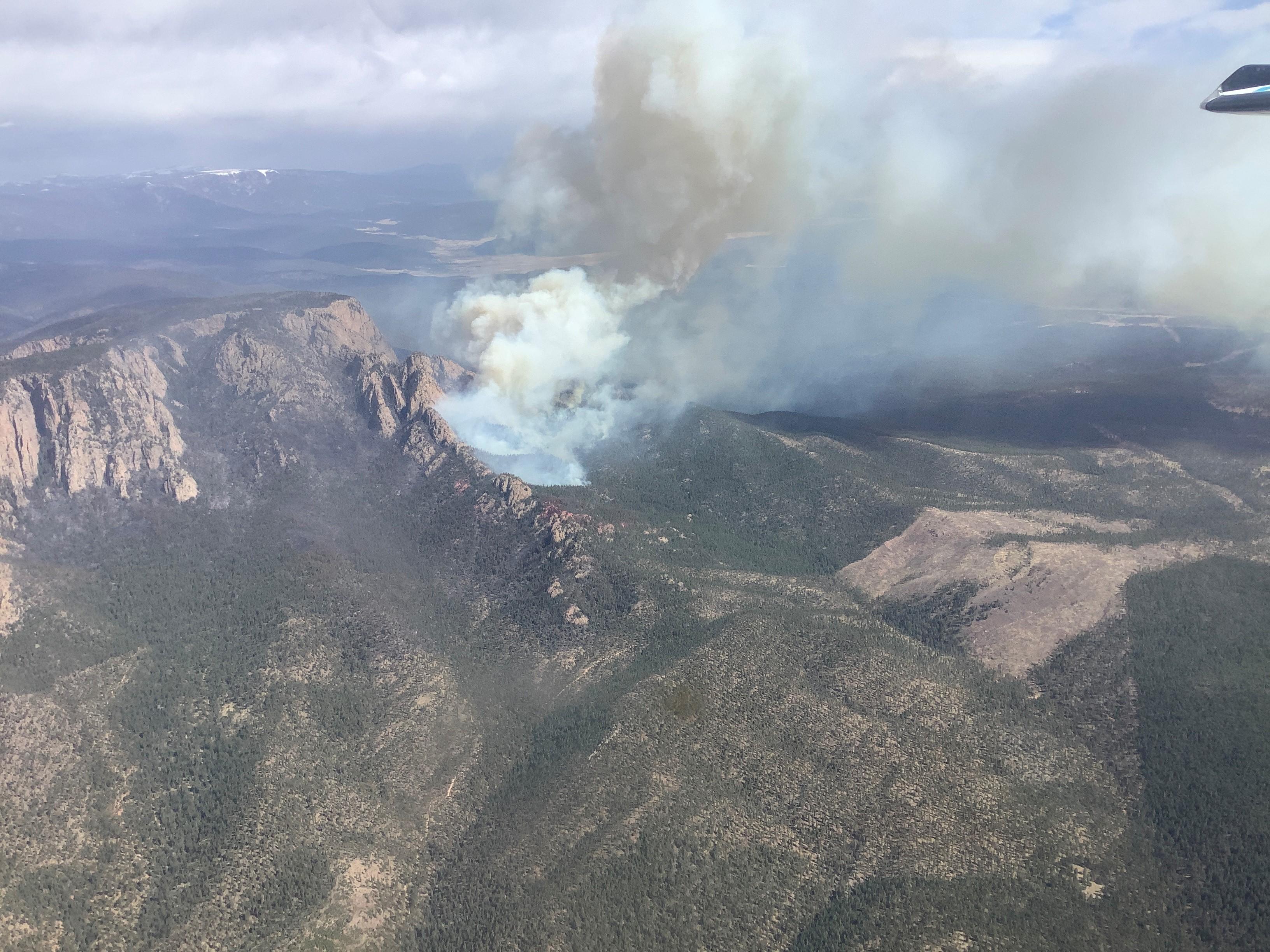Aerial photo of Hermits Peak Fire on the morning of April 10, 2022