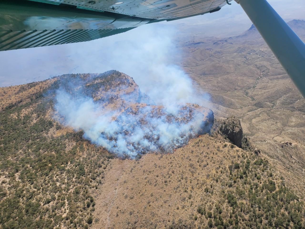 This photo shows an aerial view and smoke from the South Rim Too fire. Photo taken from park airplane.