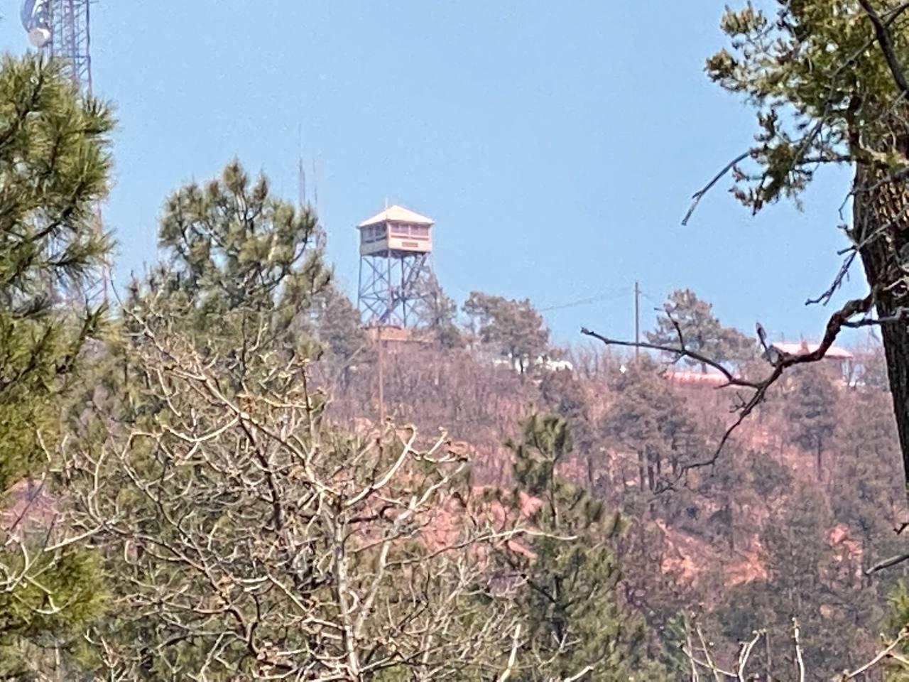 Lookout tower on Mt Union red from retardant dropping