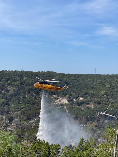 Type 1 Helicopter drops water on the Johnson Fork Fire on May 12, 2022.