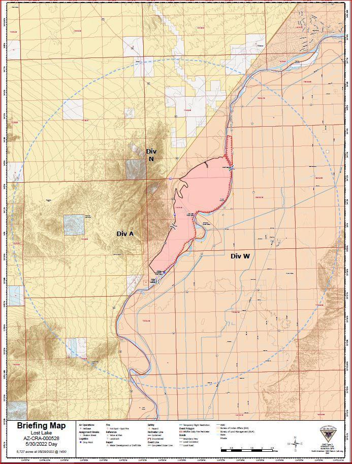 Western flank shows a black line for containment while the eastern flank is red showing uncontainment.area. Fire area is 5,727 acres