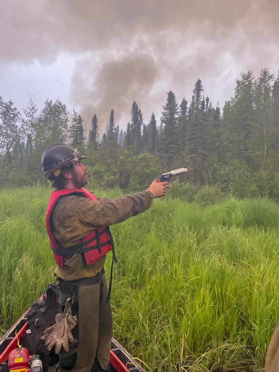 Defensive burning operations from prepared indirect fireline around remote Lime Village, Alaska