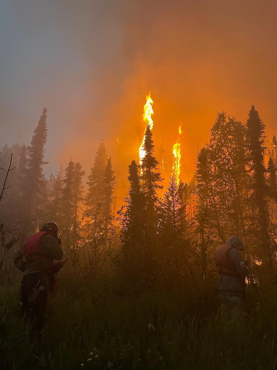 Defensive burning operations from prepared indirect fireline around remote Lime Village, Alaska