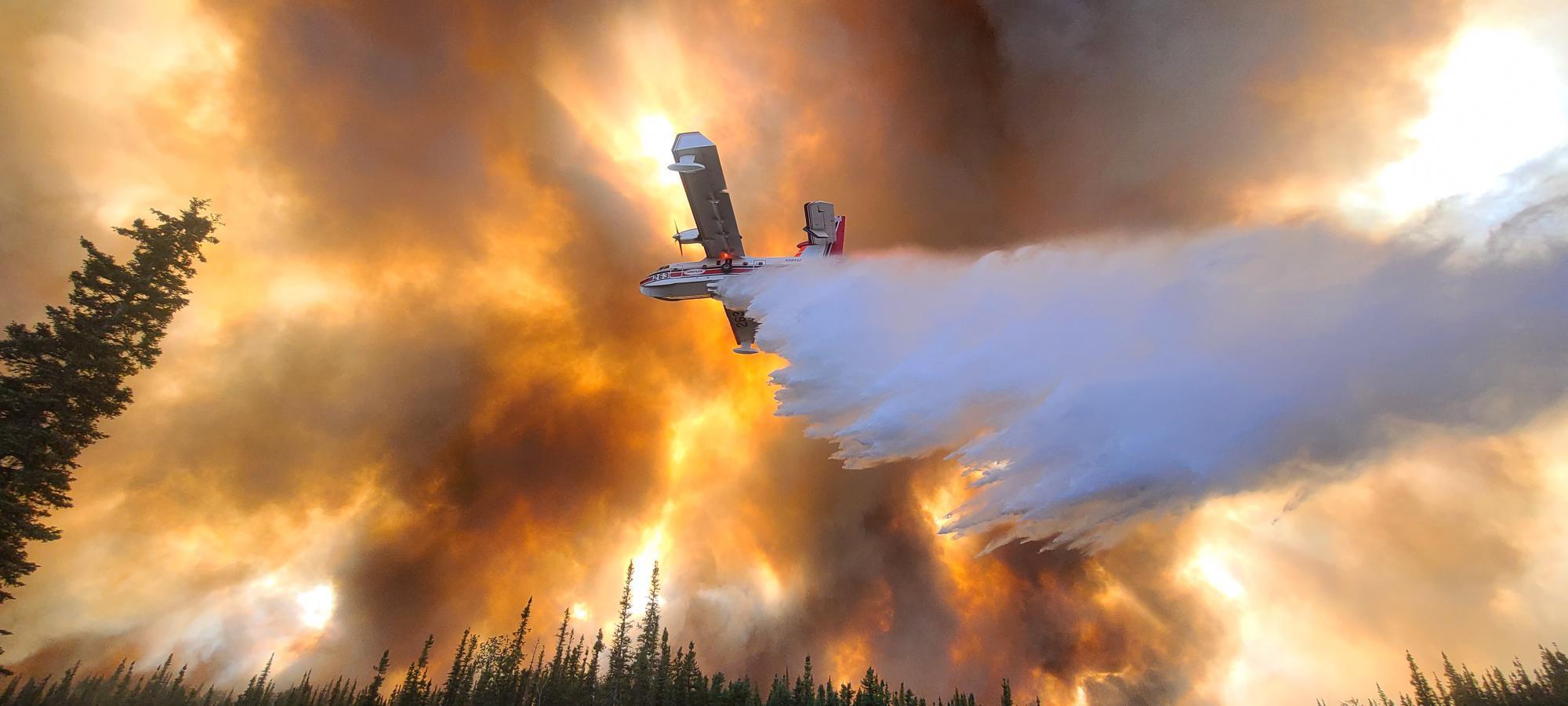 Aircraft making water drops in Division K of the Clear Fire . July 7, 2022