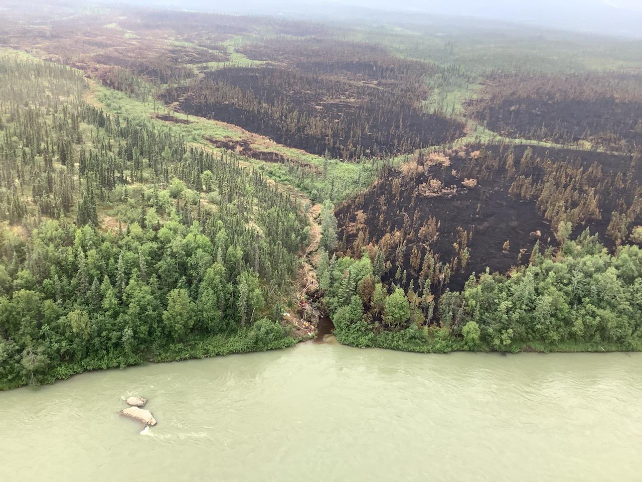 This aerial photo shows the pattern of burned areas from defensive firing operations near Lime Village. (courtesy of Karen Scholl, Alaska Incident Management Team)