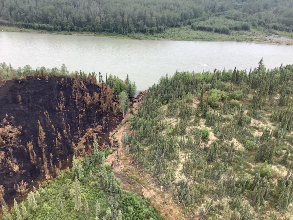 This aerial photo shows the pattern of burned areas from defensive firing operations near Lime Village. (courtesy of Karen Scholl, Alaska Incident Management Team)