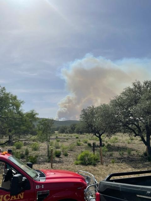 Large column of smoke in the distance