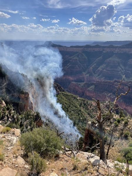 Fire is seen below the canyon rim on 7-20-2022