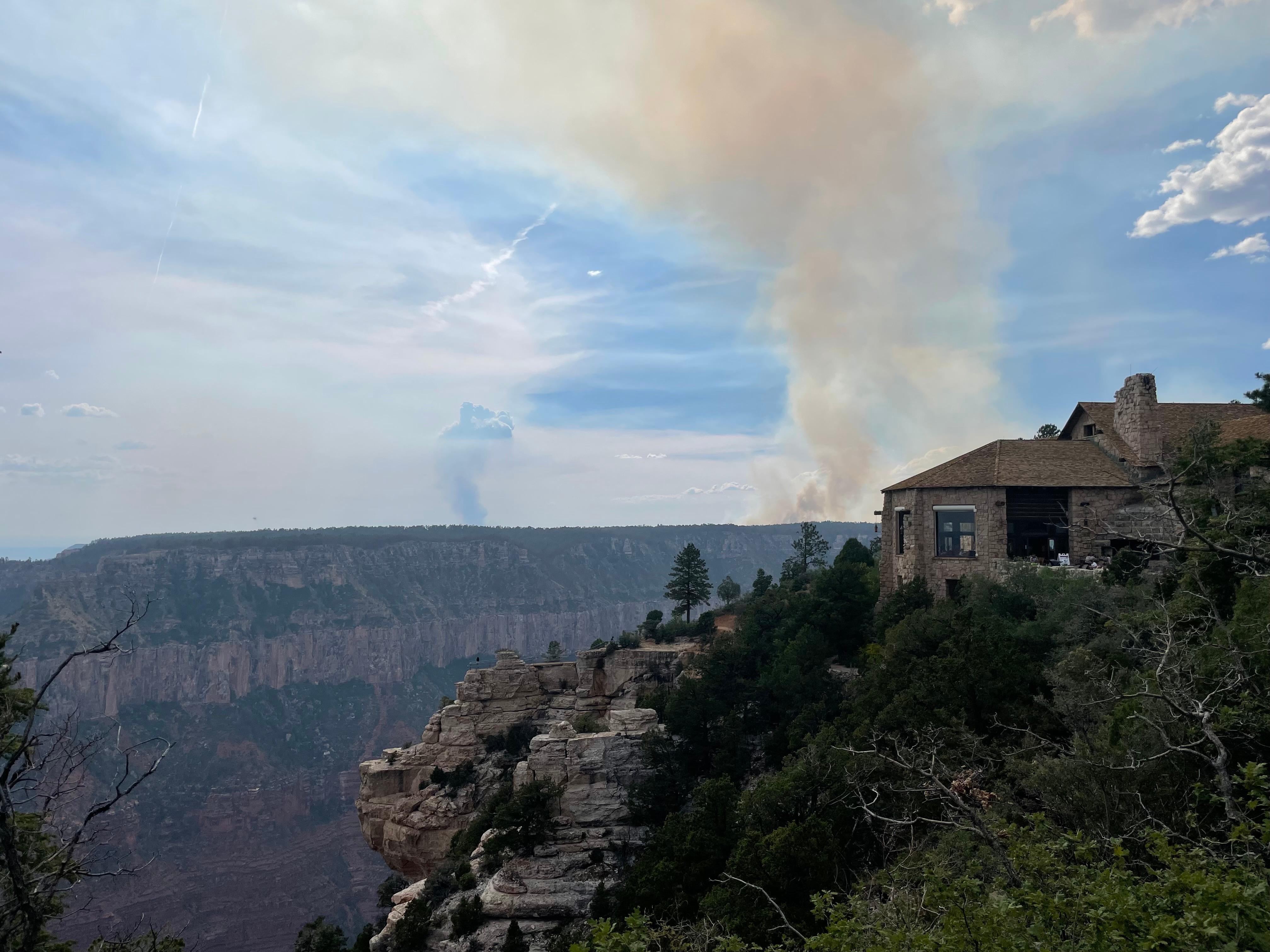 A plume of smoke is seen from the Grand Canyon North Rim Lodge on 7-21-2022