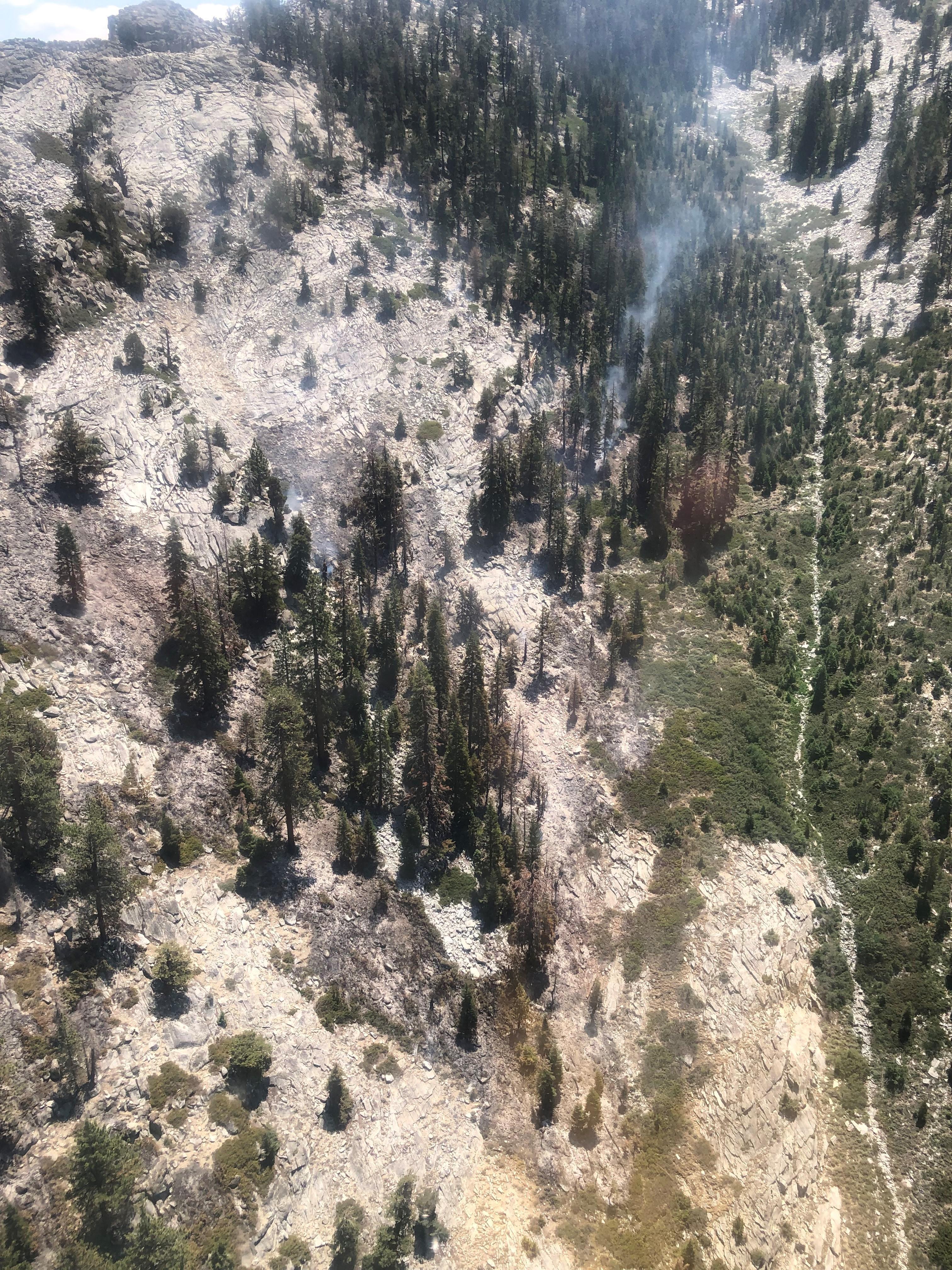 The fire shows slow movement up slope up canyon towards Avalanche Peak.  The fire remains to the east of the no name drainage / rock chute