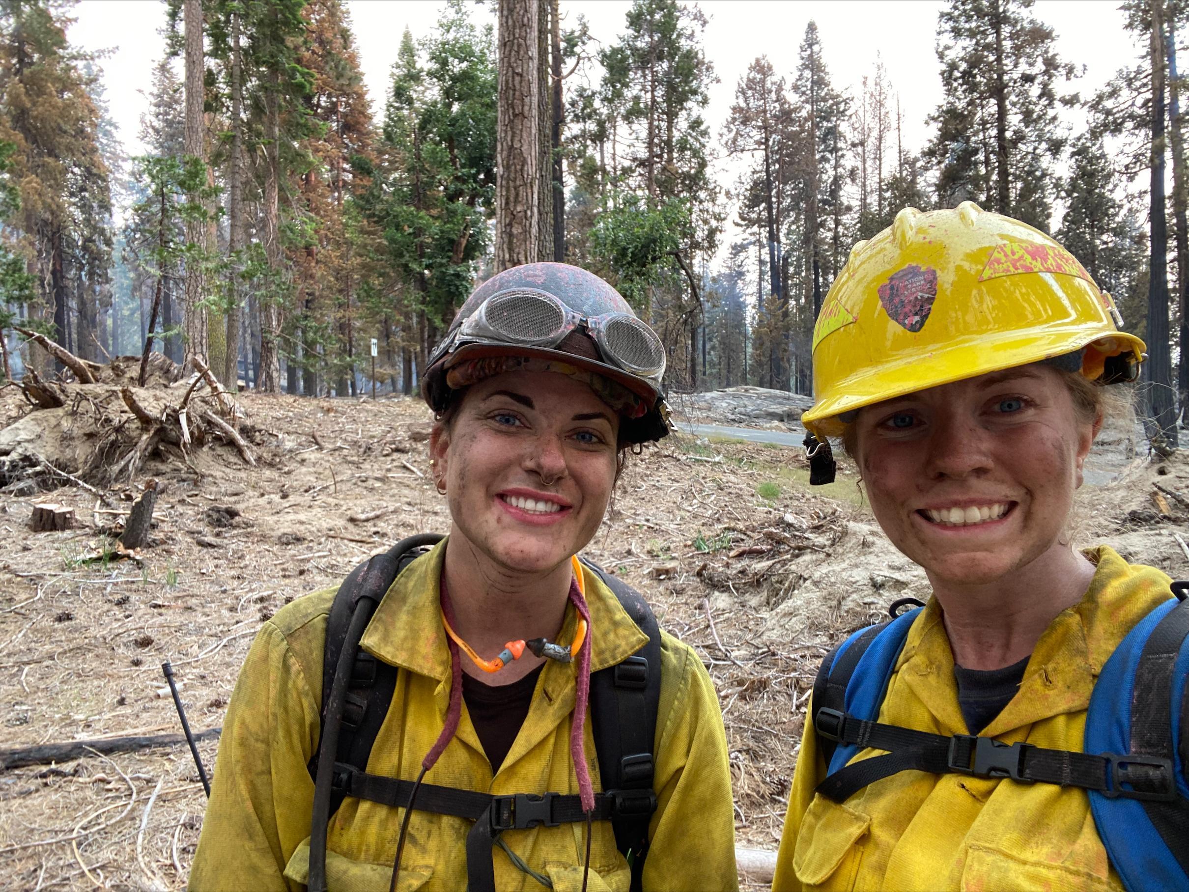 Rilee Nilsson and Sarah Platt from Yosemite National Parks Wildland Fire Module Crew 1 come off the line after initial attack of the Washburn Fire