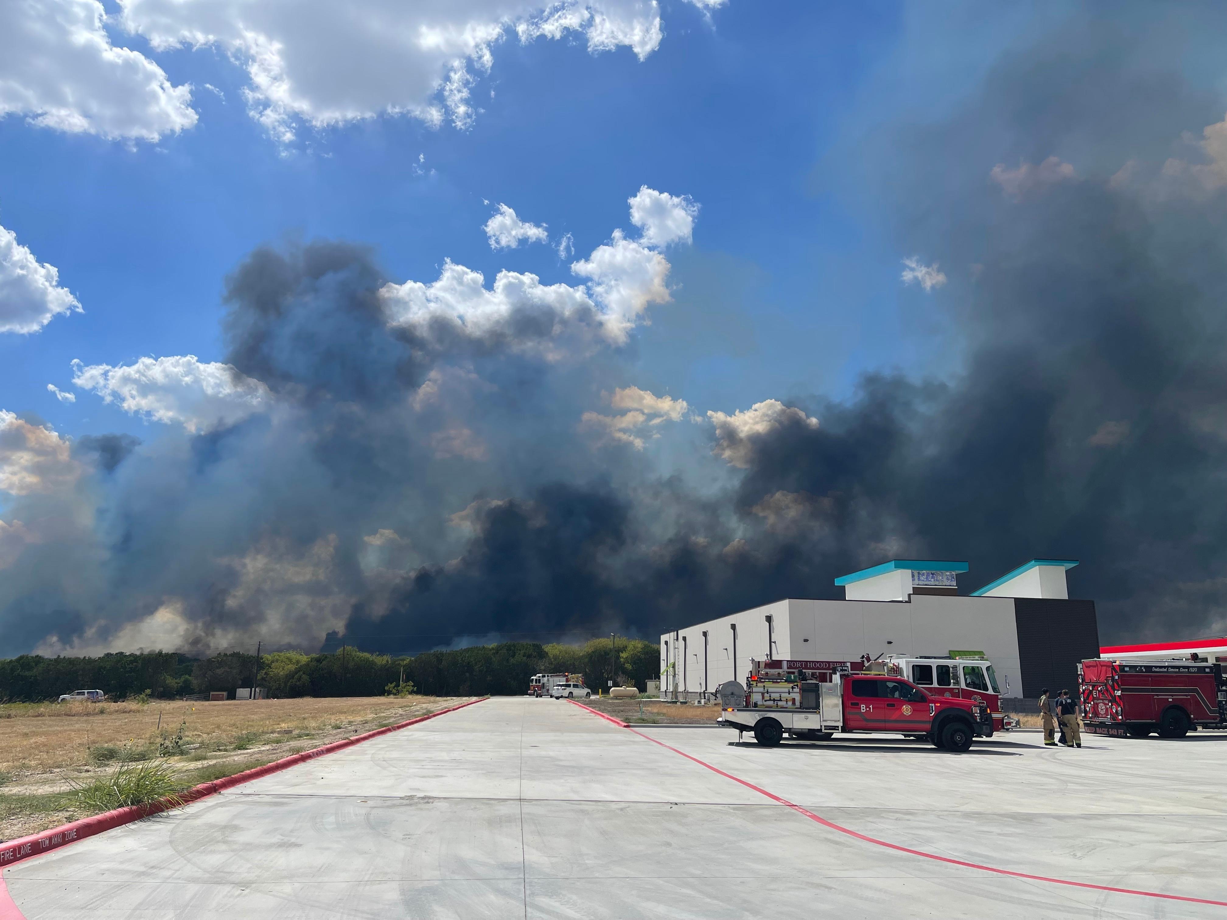 Fire trucks refilling with water