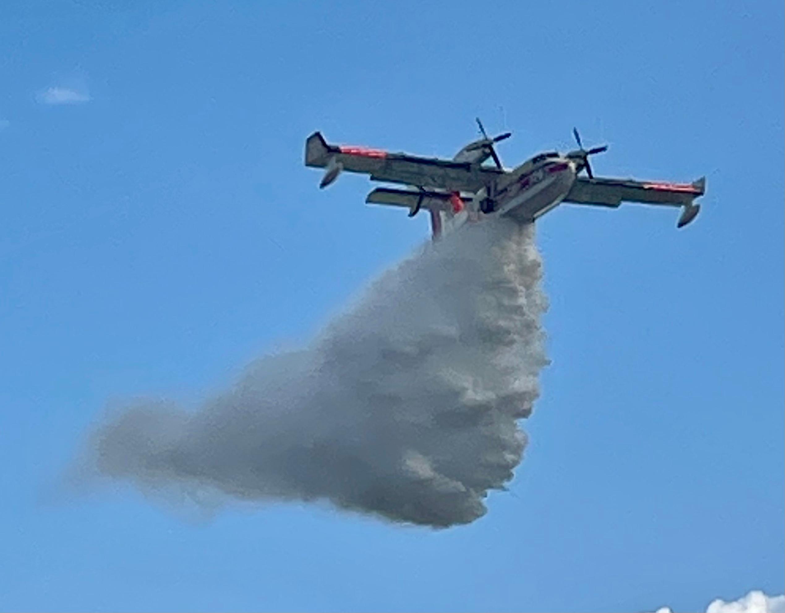 Fire Bosses dropping water on the Dog Ridge Fire