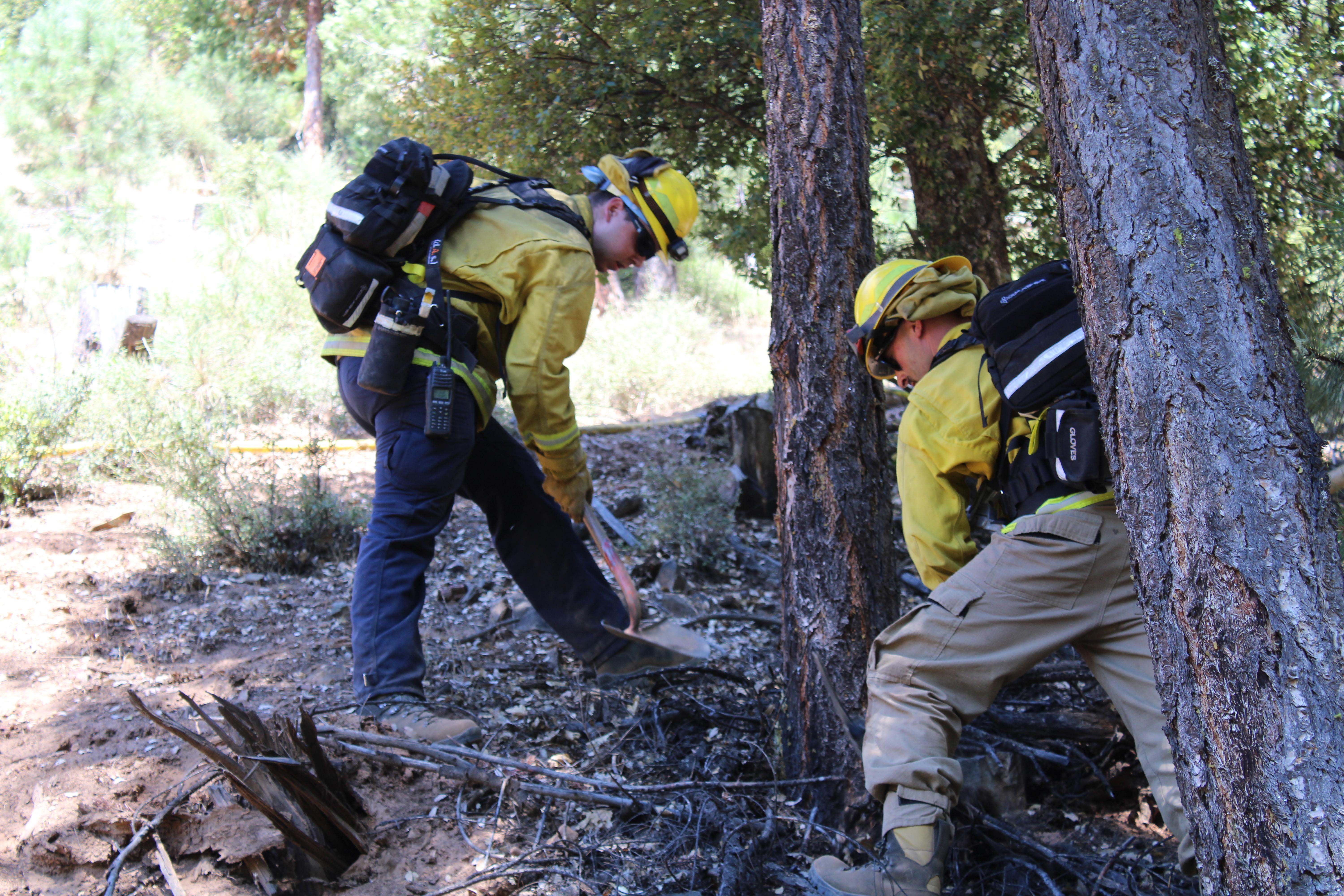 Antelope Valley Fire crewmembers mopping up at Smokey Fire