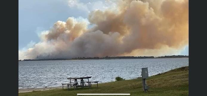 Smoke plume from the Burns Creek Fire as seen from the opposite shore of Lake Sommerville.