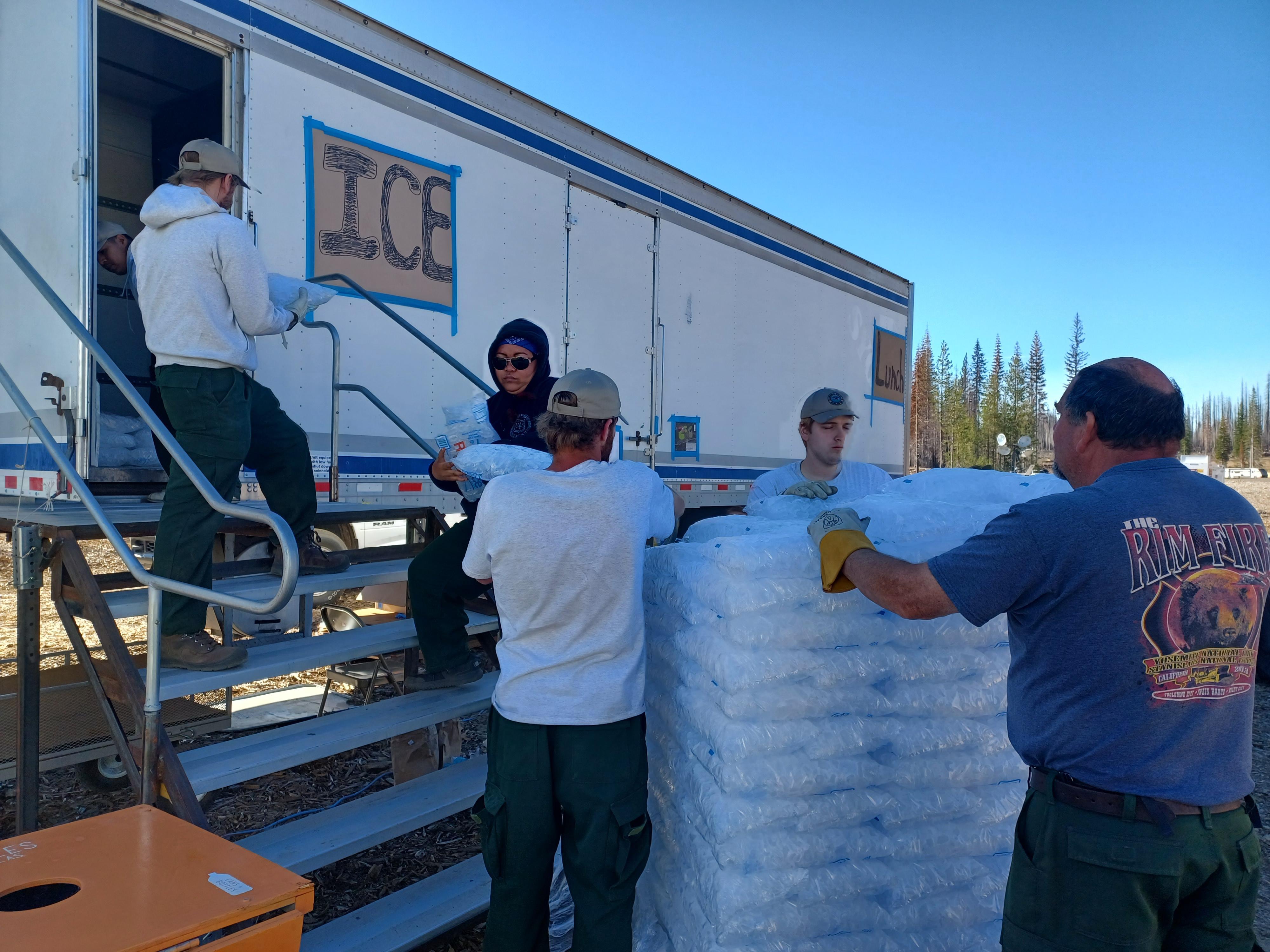 Angell Job Corps crew loading ice