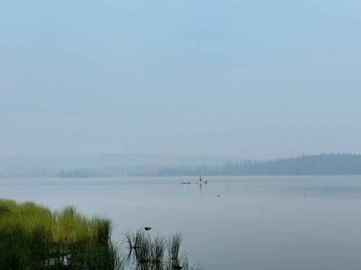 Paddle boarding at Waldo Lake amidst the smoke from the Cedar Creek Fire