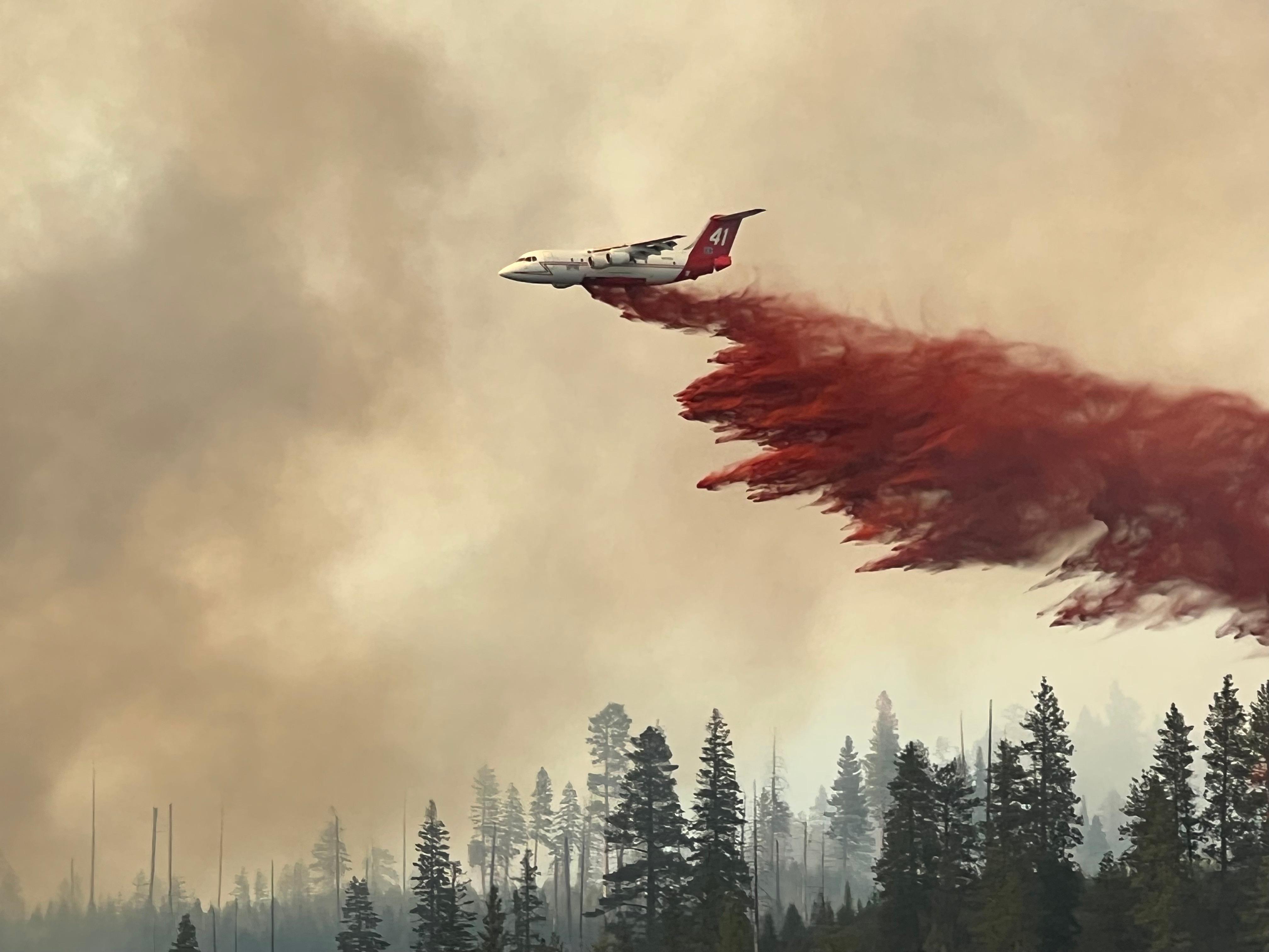 Large Air Tanker (LAT) dropping retardant to slow progression on the Crockets Knob Fire on the Malheur NF on 8/25/2022
