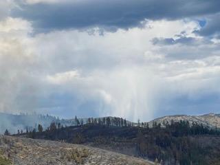 Virga is rain that does not quite make it to the ground. It does raise humidities in the area which helps moderate fire behavior.