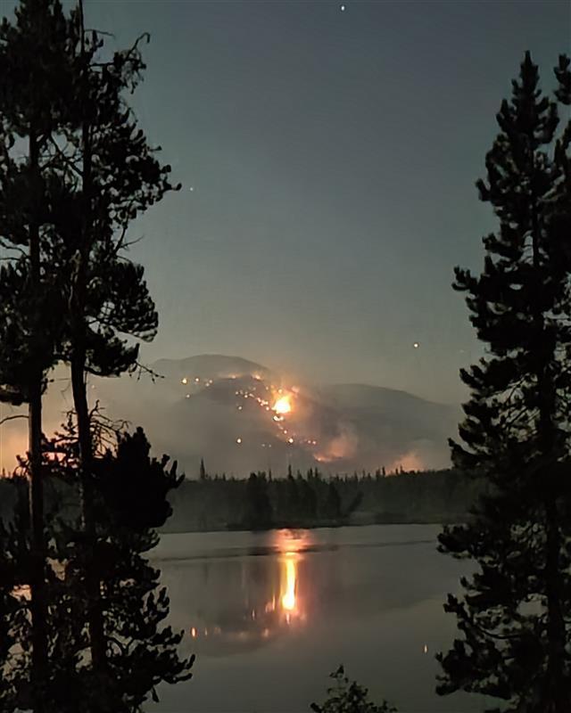 Fire along Alturas lake shore at night 9/8