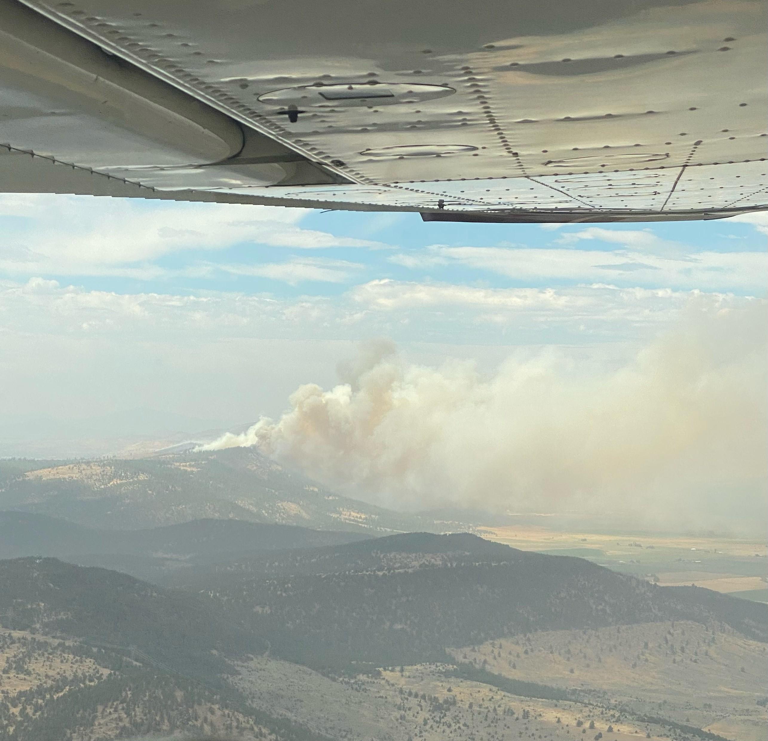 Picture taken from an aerial observer on Recon 6ZC on day one of the fire. This recon plane was not doing any initial attack duties. They were on a recon mission to look for smokes due to the lightning in the area.