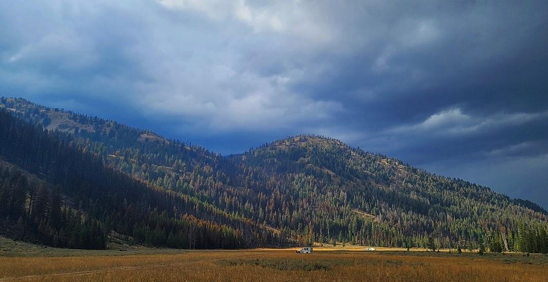 Stormy skies over a mountain on the Ross Fork Fire