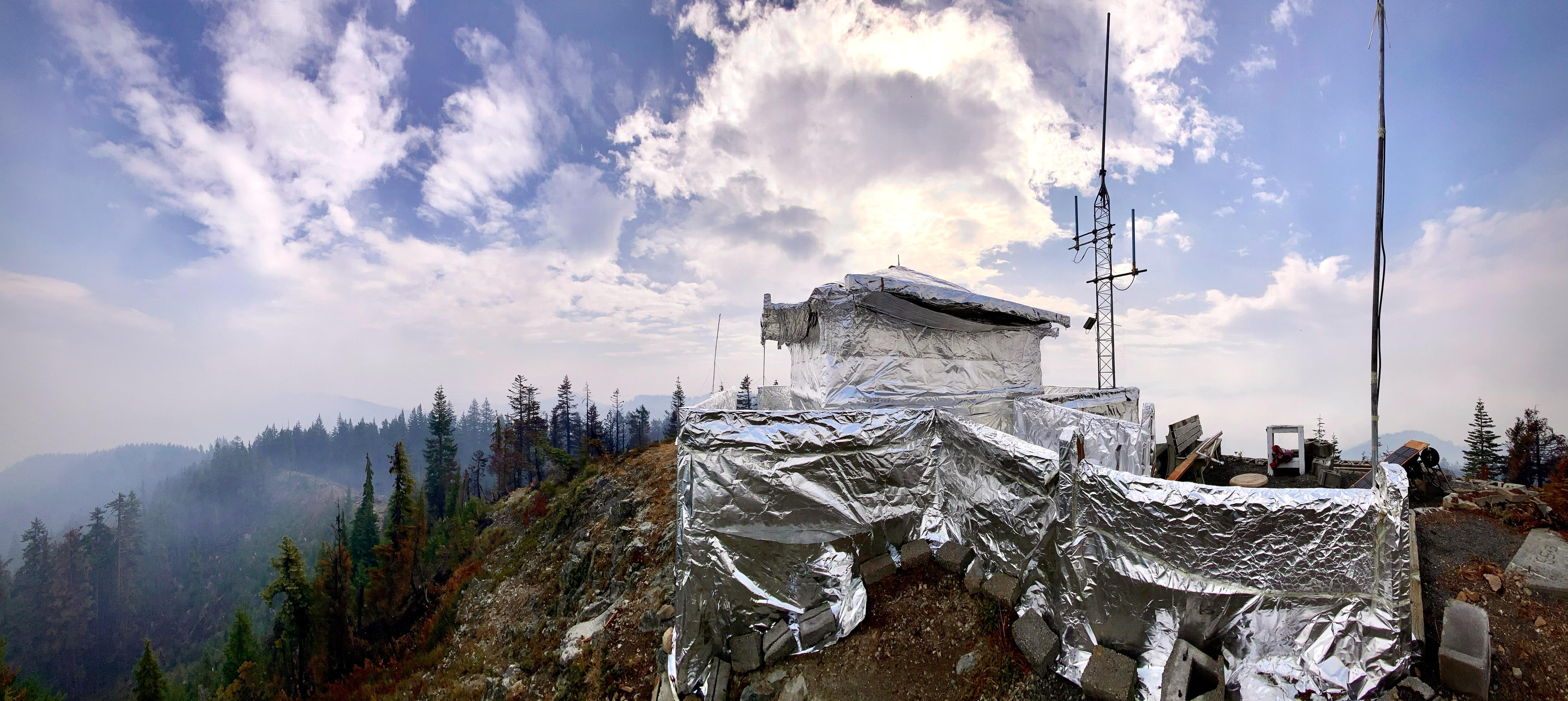 Lookout tower wrapped in protective wrap 