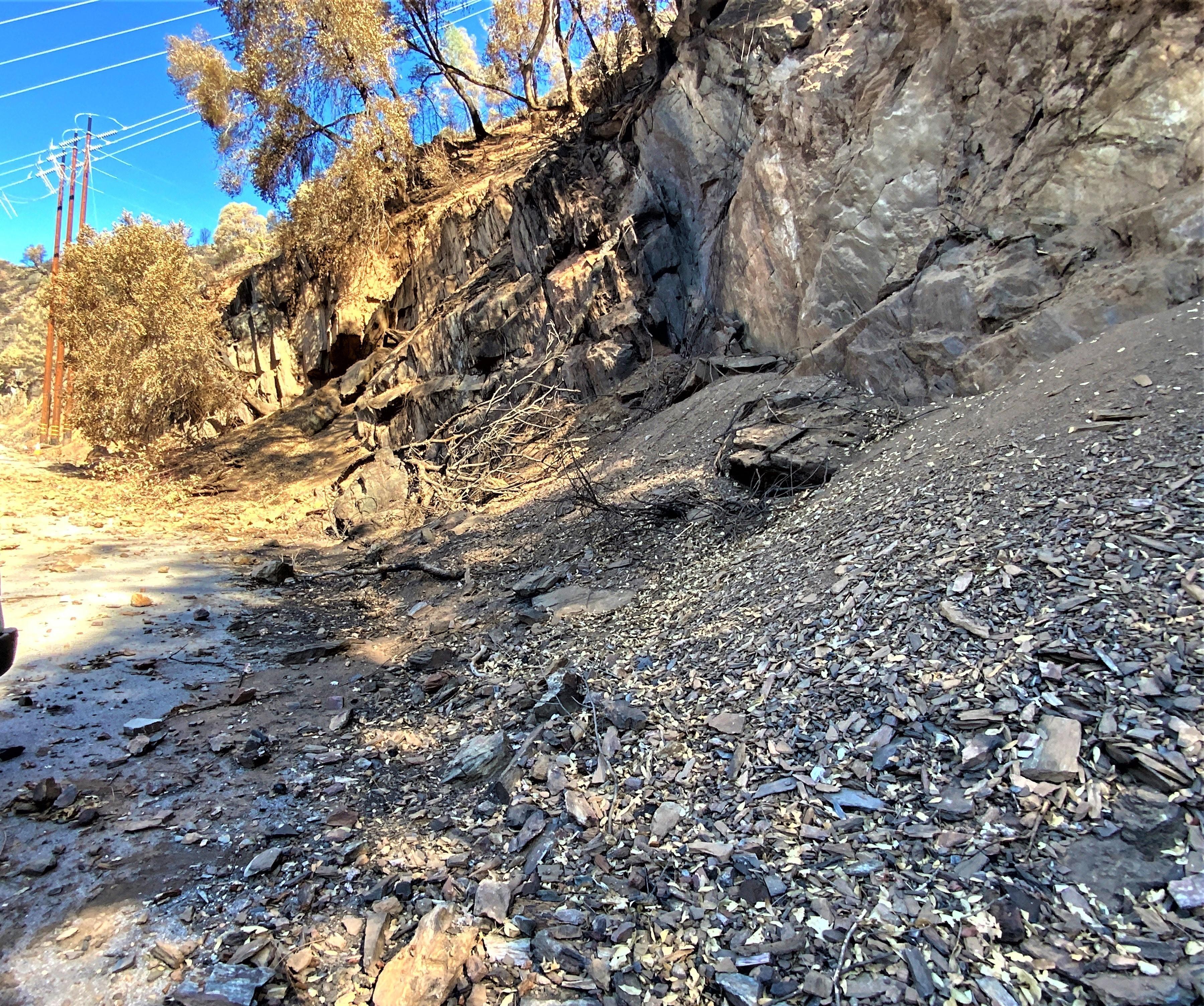 Image showing Rocks and other debris hazards along road in Mosquito burned area