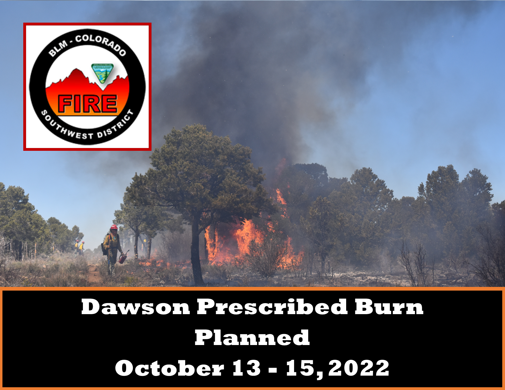 BLM Southwest District Fire - Dawson Prescribed Burn Planned Oct. 13 - 15, 2022. Three wildland firefighters working on prescribed burn. Photo has trees, fire, smoke and blue sky.
