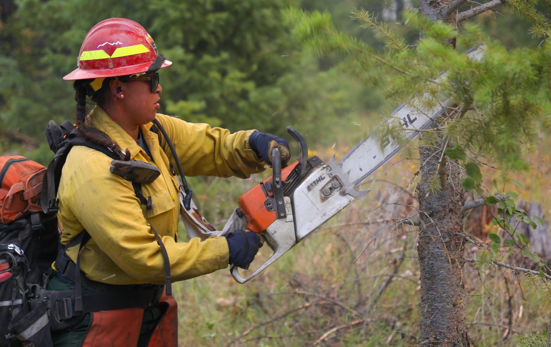 Firefighter conducting saw work.