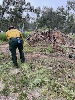 Firefighters prepare the burn piles for ignition on the Del Rosa prescribed burn 4/12/23.