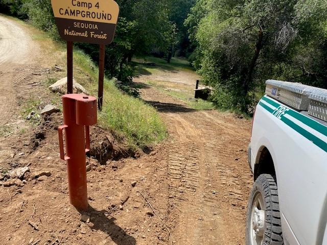 The entrance to Camp 4 Campground on the Sequoia National Forest after road work is completed.  Road is smooth.