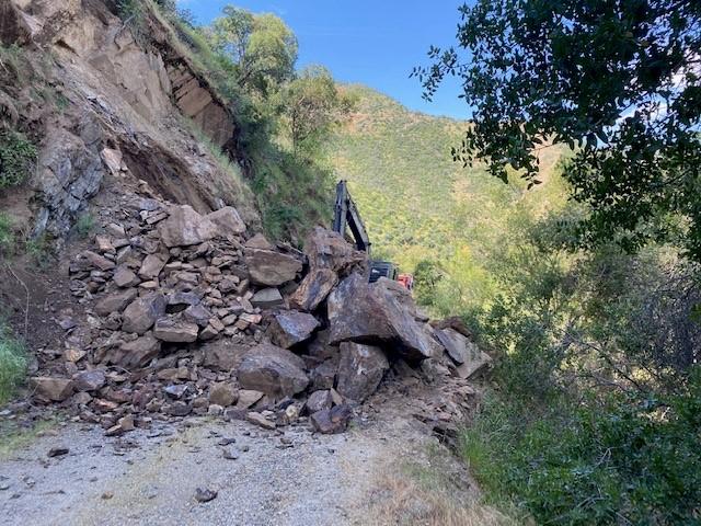 A rockslide completely blocks a forest road on the Sequoia National Forest.