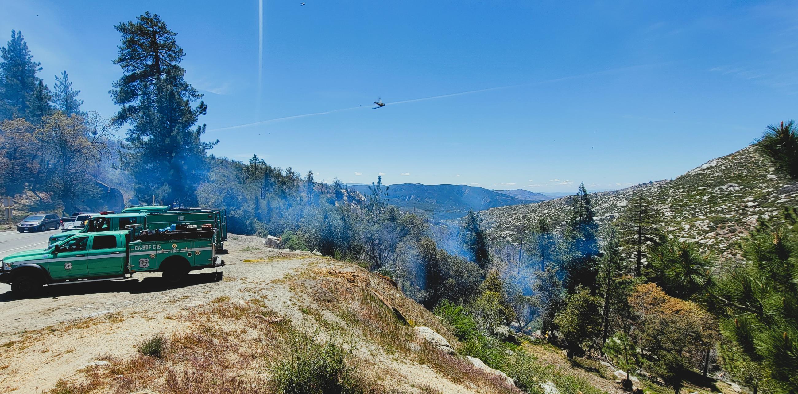 Firefighters work the Cranston Reforestation prescribed burn along Highway 243 5/8/23.