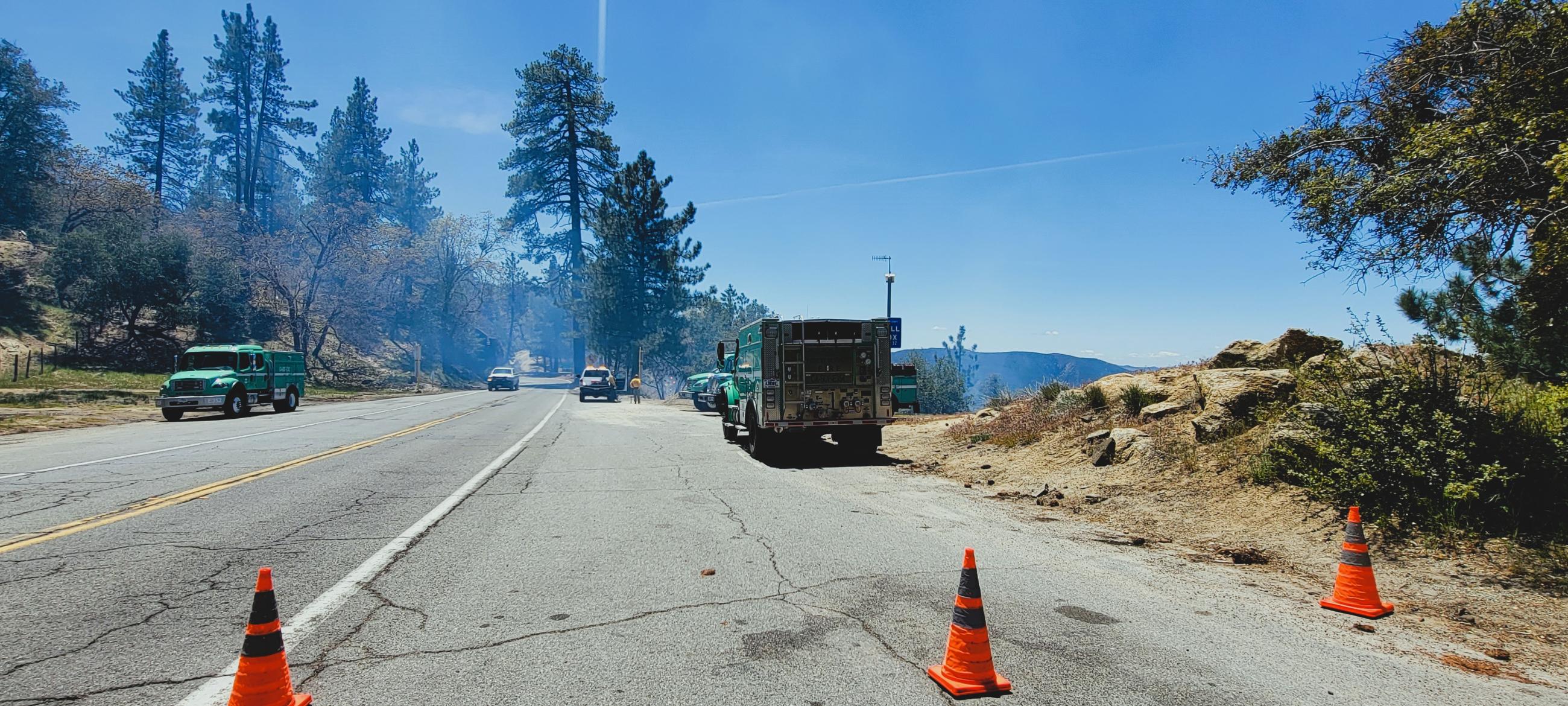 Firefighters work the Cranston Reforestation prescribed burn along Highway 243 5/8/23.
