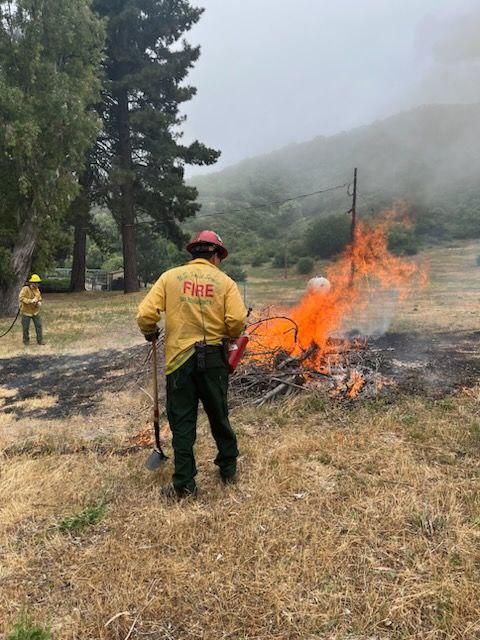 Firefighters ignite a burn pile on Lytle Creek Prescribed burn 5/23/23.