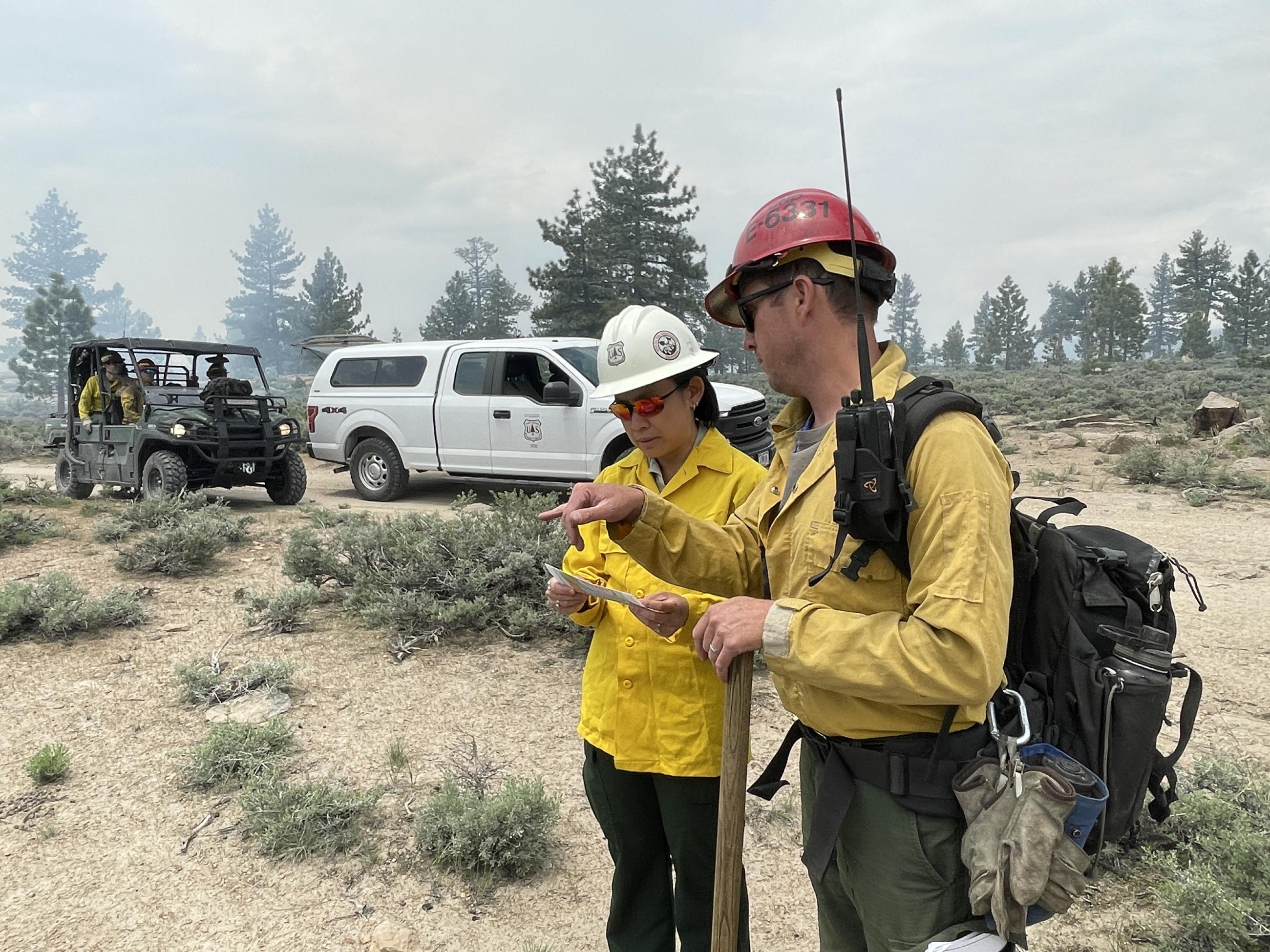 Image showing Inyo Forest Supervisor Lesley Yen and Burn Boss trainee briefing on Casa Diablo prescription burn plan