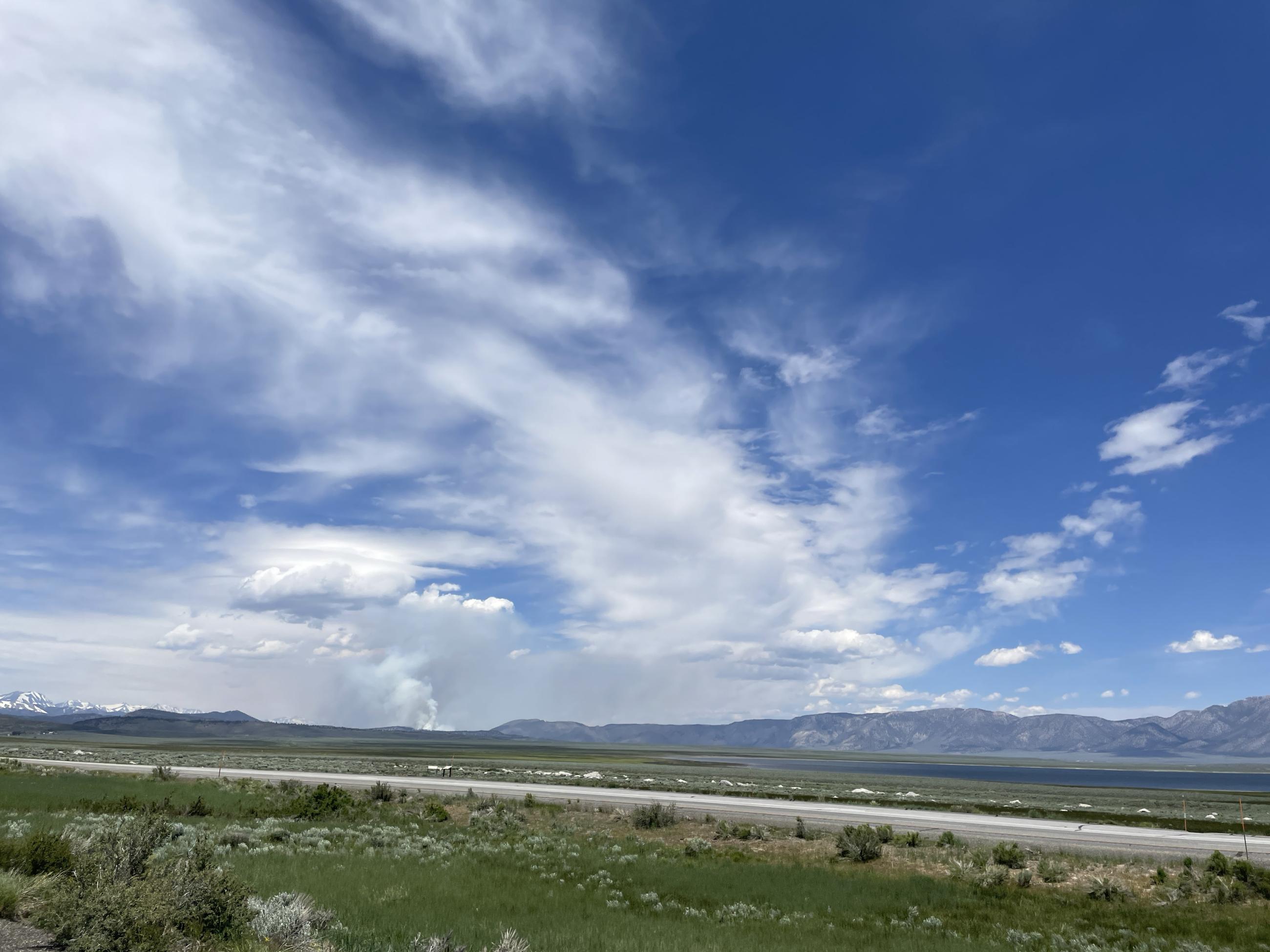 Image showing clouds and some smoke in the distance from a View of Antelope Prescribed Burn from Crowley Lake Area